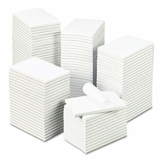 Stacks of white paper pads in various sizes.